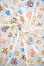Load image into Gallery viewer, Close up picture of Fabric. Organic cotton. Exclusive coral reef print for BRAND The Label Sarongs, Pareos and cover ups 

