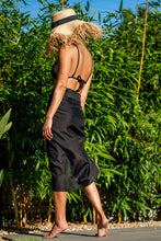 Load image into Gallery viewer, Luxurious silk and cotton sarong wrapped around waist for a skirt look. From BRAND. The Label. resort wear made in Australia 
